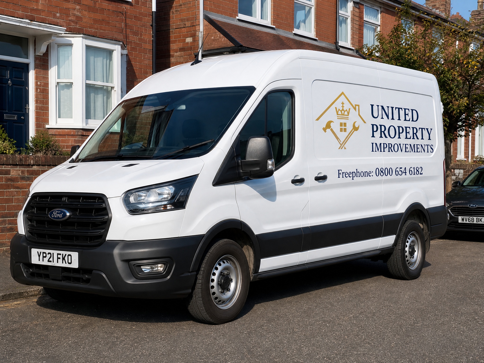 United Property Improvements branded white work van